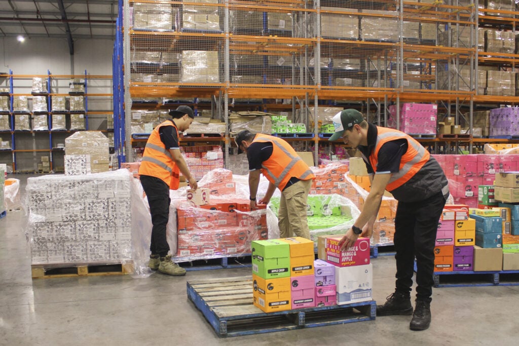 Warehouse staff checking inventory at Icelander Logistics distribution centre