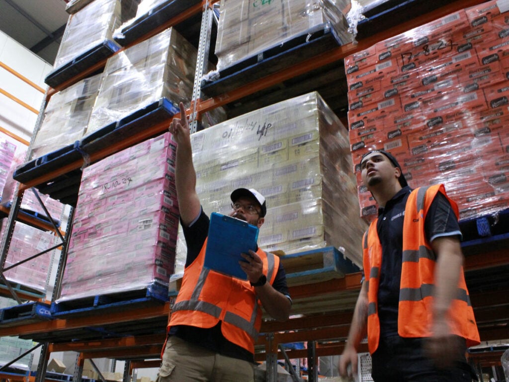 Cold freight pallets of sweets in temperature-controlled facility for distribution