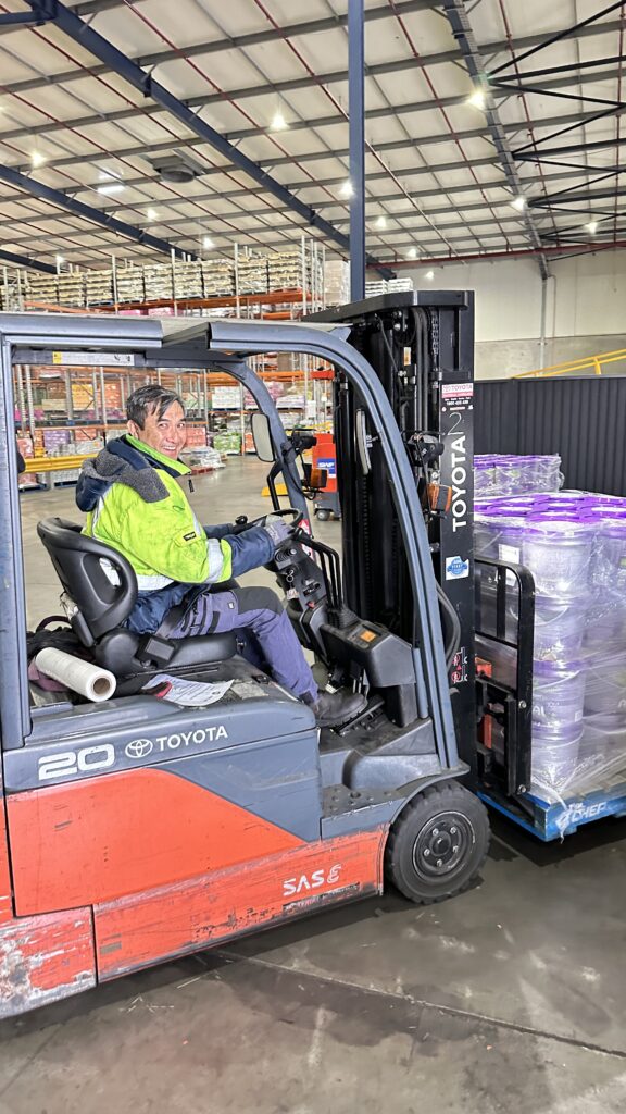 Refrigerated transport truck loading ready meals for cold freight
